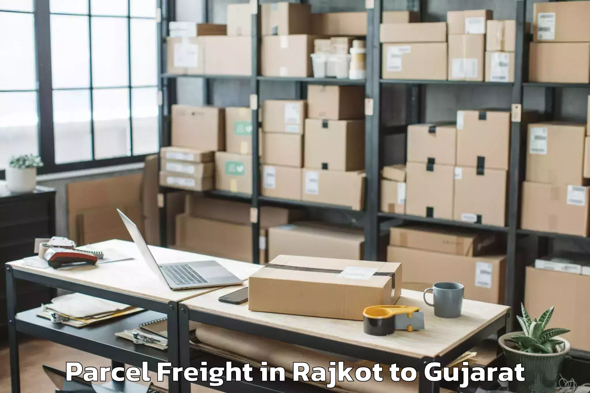 Affordable Rajkot to Hansot Parcel Freight